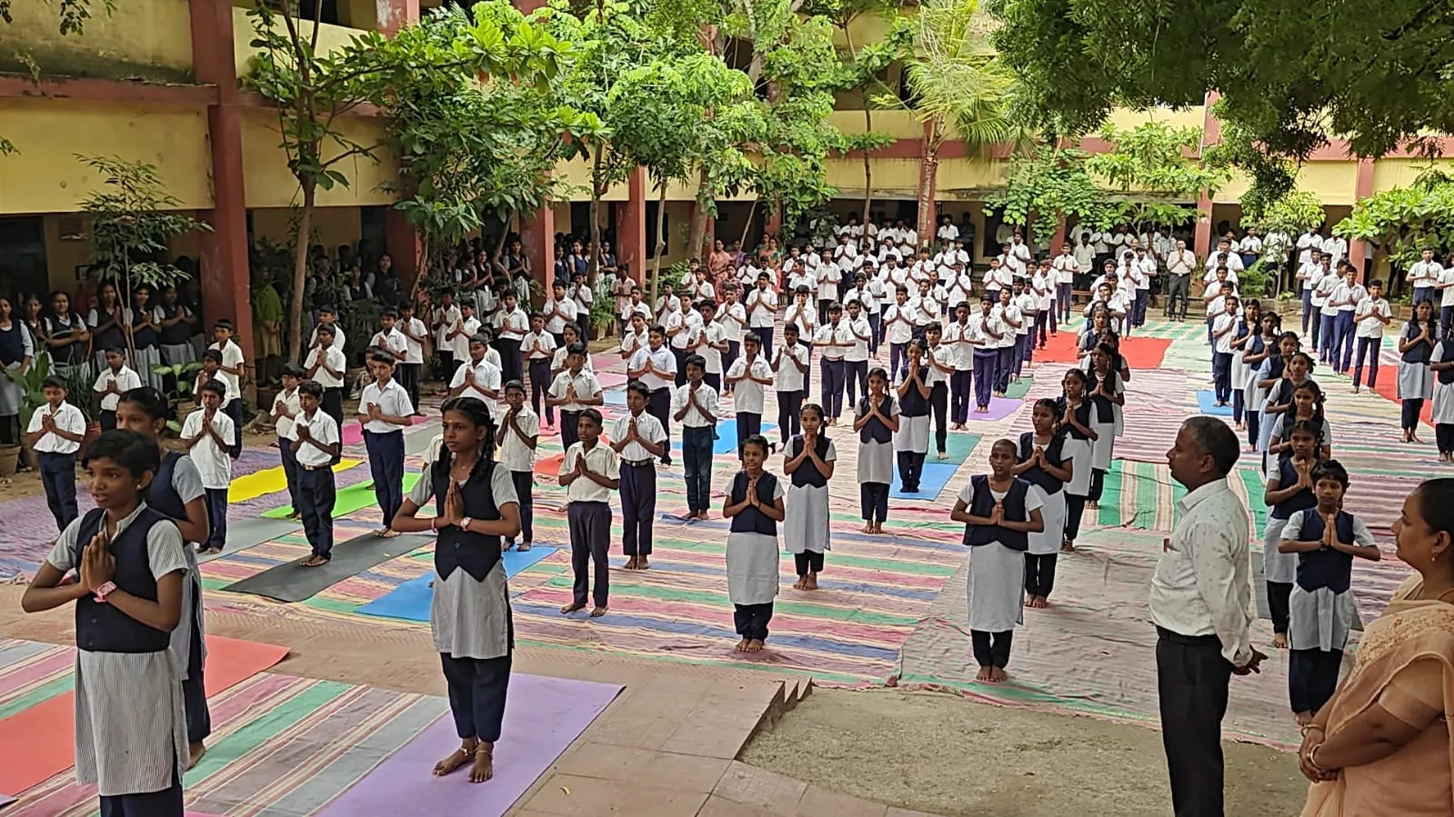 Morning assembly in the SKDT school courtyard
